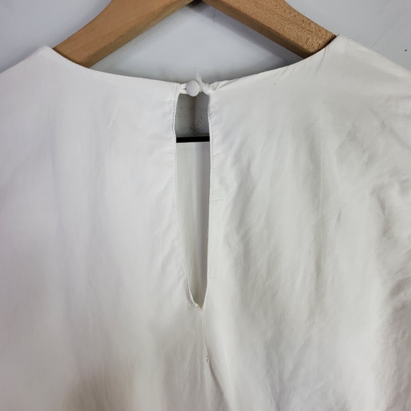 The Jetset Diaries Bell Sleeve Lace Hem Keyhole Back Top White Revolve Small - Picture 6 of 12